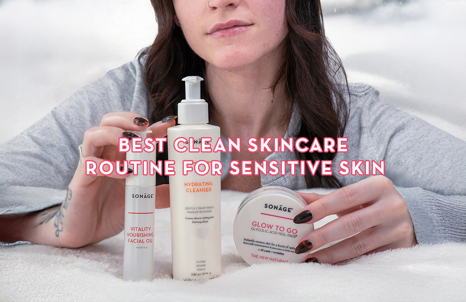 Woman holding skincare products with a snowy background