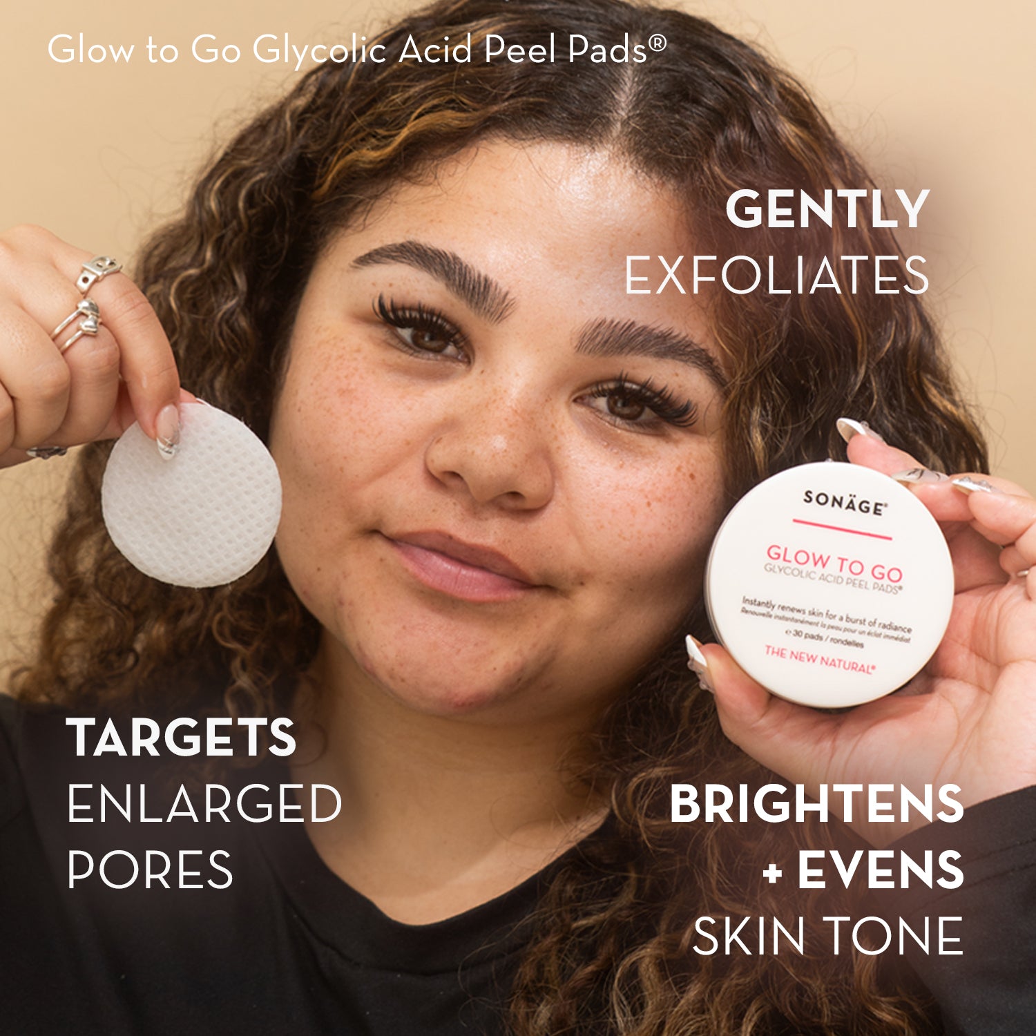 Woman holding Sonáge Glow to Go Glycolic Acid Peel Pads with product details on a beige background