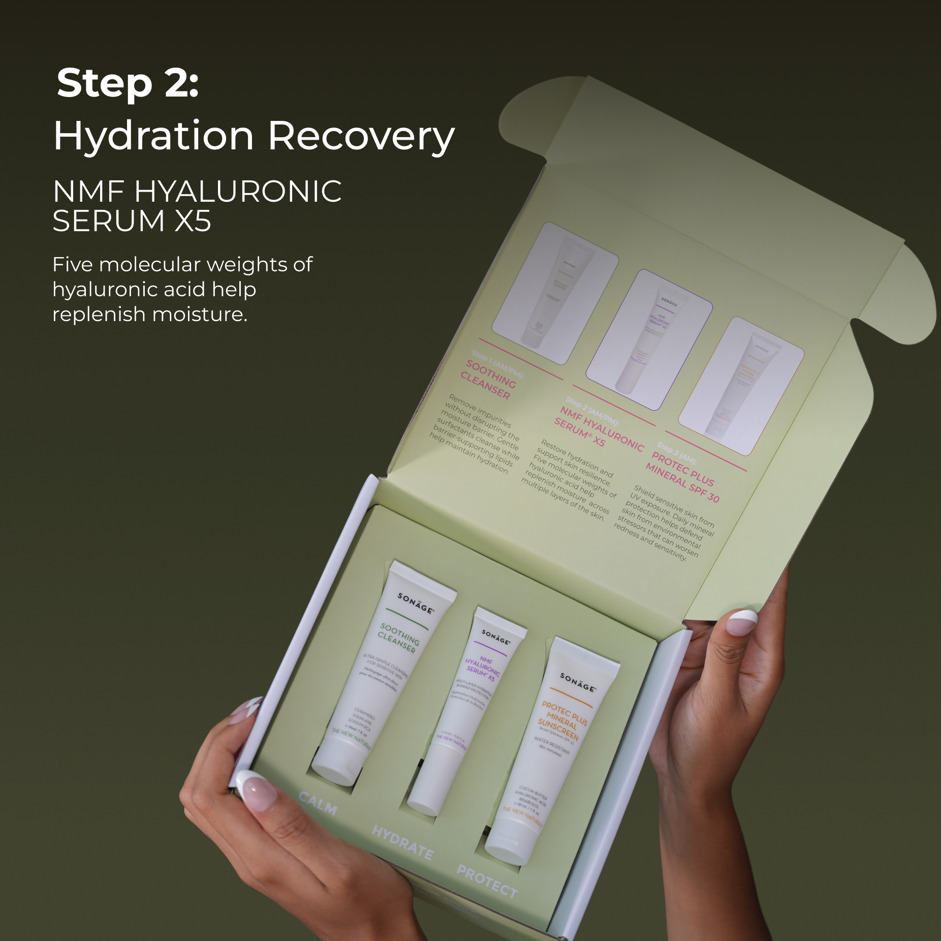 Opened Sensitive Skin Barrier Recovery Kit box being held up by two hands revealing inside packaging design and three white tube Sonage skincare product bottles