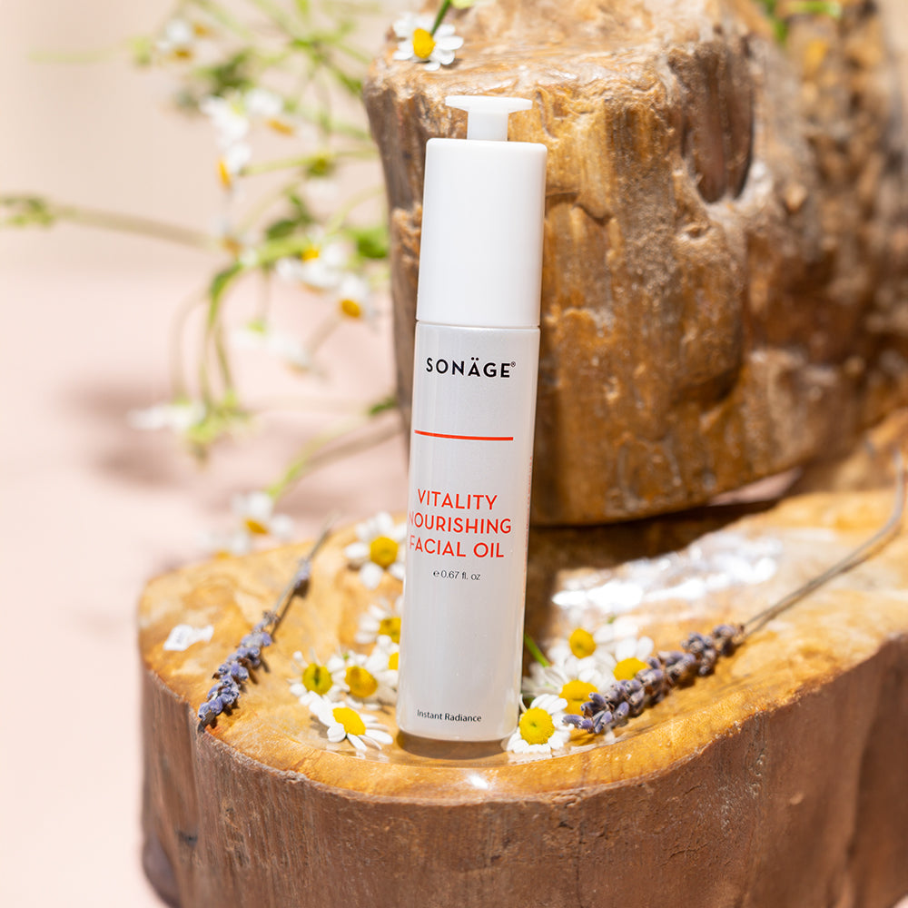 facial oil on stone shelf