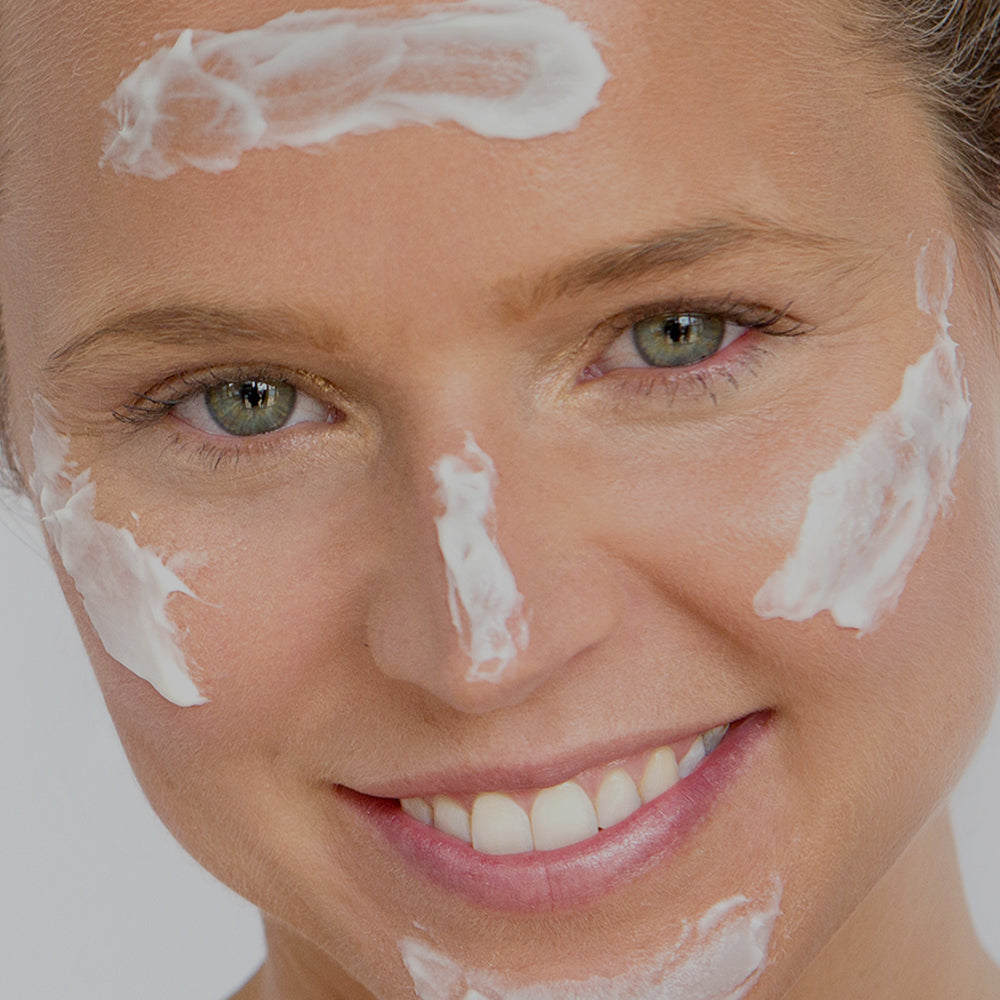 white cleanser on woman with fair complexion