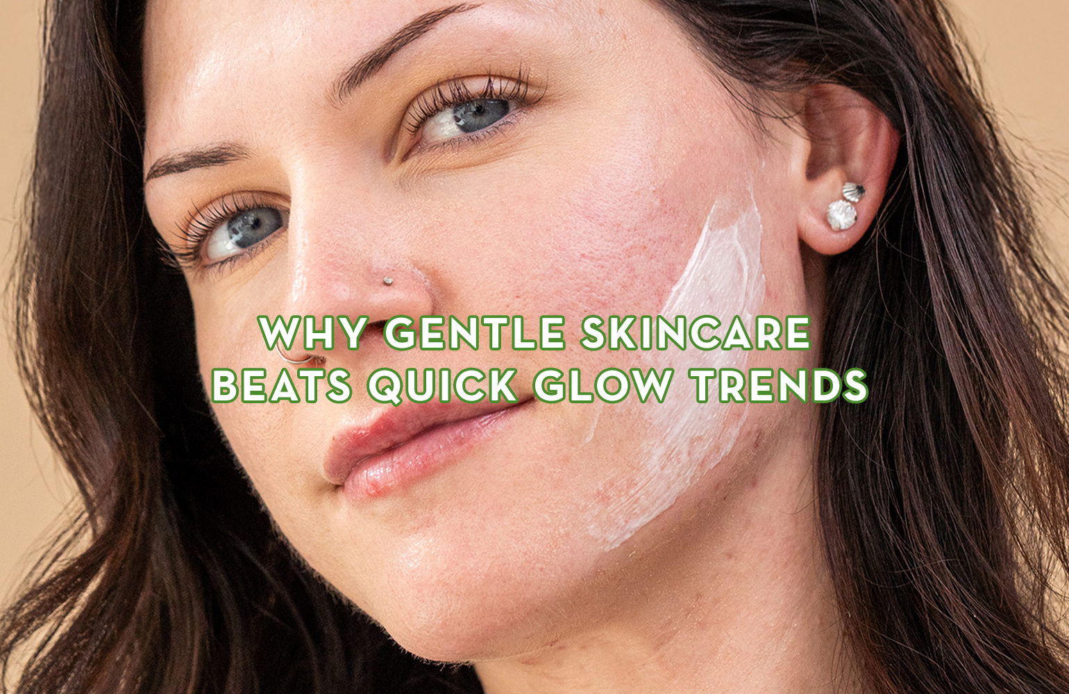 woman looking into camera with unblended patch of moisturizer on cheek with blog title text overtop