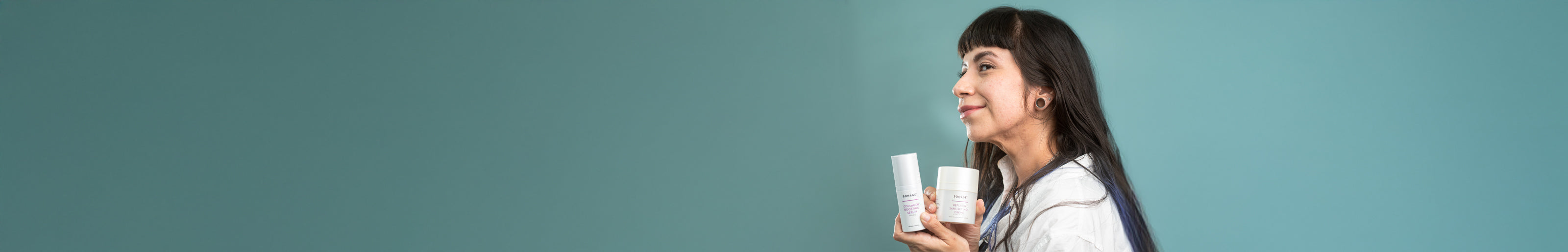 Woman holding Sonage's Firming and Skin Plumping Duo